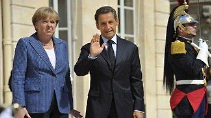 «Όχι» Μέρκελ- Σαρκοζί σε έκδοση ευρωομολόγου
