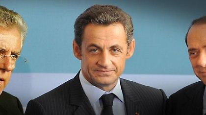 Εντιμότατοι φίλοι Μόντι, Μπερλουσκόνι, Σαρκοζί