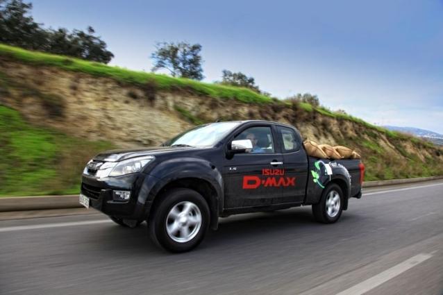 Ρεκόρ οικονομίας καυσίμου Isuzu φορτωμένο με ελιές