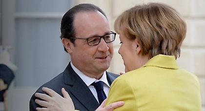 Μέρκελ-Ολάντ:«Eπιθυμούμε την παραμονή της Ελλάδας στην ευρωζώνη»