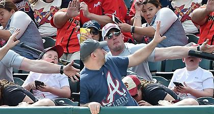 Ήρωας σώζει παιδάκι από ροπαλιά στο κεφάλι (pics)