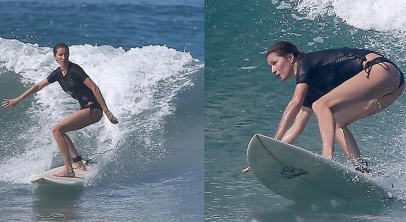Η Gisele Bundchen δαμάζει τα κύματα (pics)