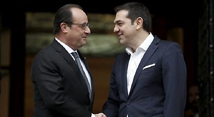 Τετ-α-τετ Τσίπρα-Ολάντ στο Άμπου Ντάμπι