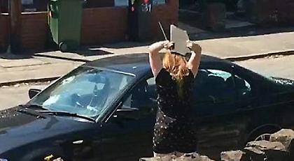 Η οργή μιας απατημένης: Ξέσπασε με μανία επάνω στη BMW του (pics/video)