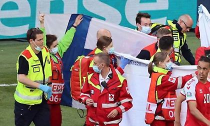 Σημαίες της Φινλανδίας δοσμένες από τους φιλάθλους τα πανιά που κάλυπταν τον Έρικσεν!