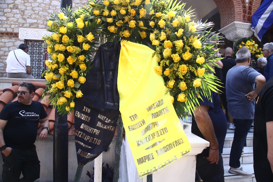 Hatzichristos: At funeral Docken - wreaths from door 13 and port 7