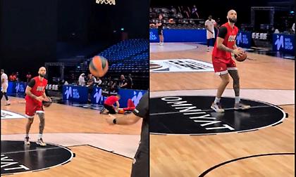 Ζεσταίνει το χέρι του ο Φουρνιέ πριν τη μάχη του Ολυμπιακού με την Dubai BC